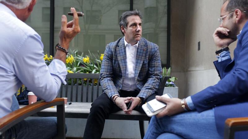 Donald Trump’s lawyer: Michael Cohen with friends on Park Avenue in Manhattan last month. After FBI raids, the US department of justice announced it was placing him under criminal investigation. Photograph: Yana Paskova/Getty