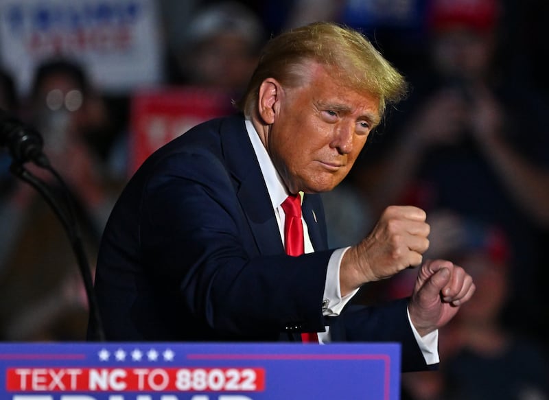 Donald Trump dances for his supporters following at a rally at East Carolina University, N.C. His entire family are banned from being involved in charities in New York due to proven misuse of donated mone. Photograph: Ricky Carioti/The Washington Post via Getty Images