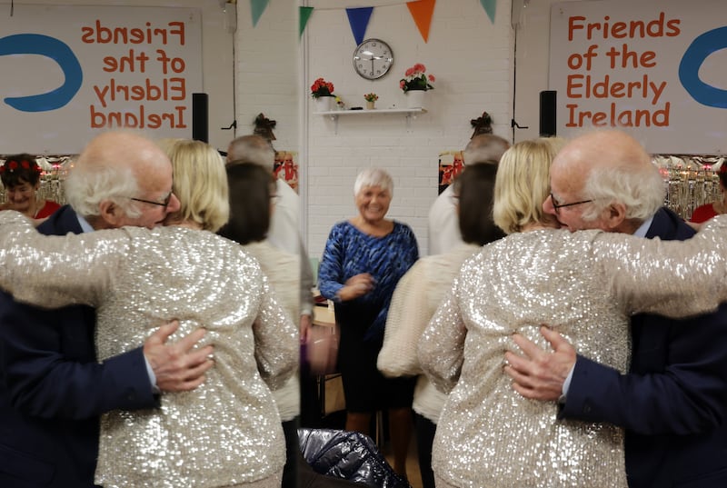 Vincent Talbot greets Caroline Whelan at the Friends of the Elderly Ireland annual Christmas party at their Bolton Street location in north Dublin. Chris Maddaloni/The Irish Times

