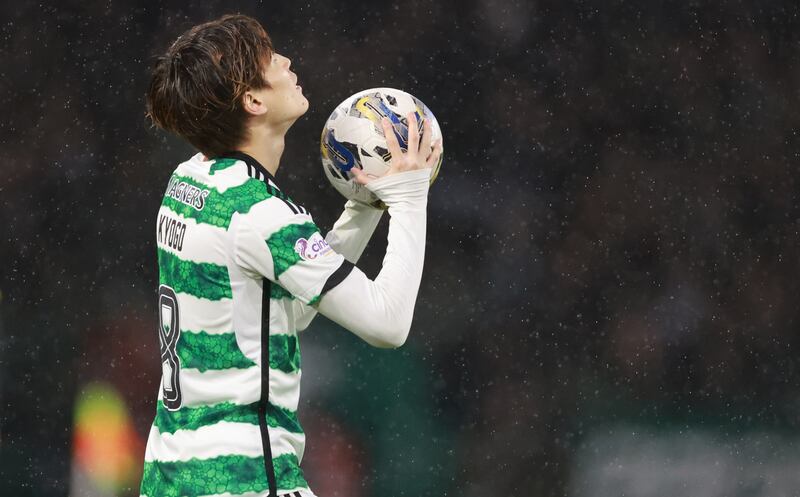 Kyogo Furuhashi celebrates the goal that effectively ended the contest between Celtic and Livingston. Photograph: Steve Welsh/PA Wire