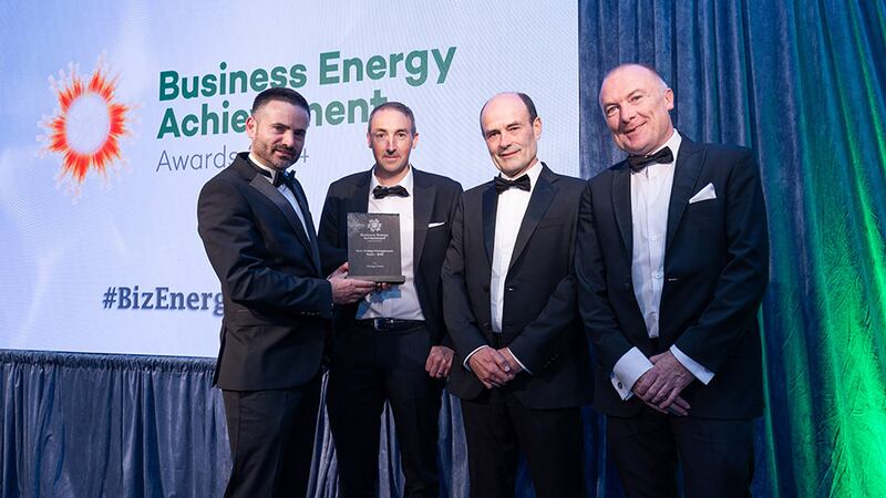 James Carton, awards judge, presents the best energy management team – SME award to Vantage Towers team