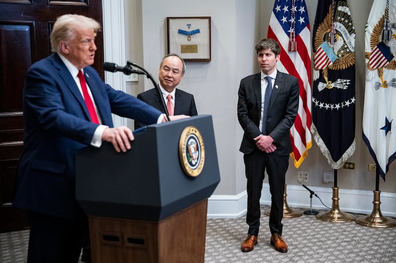 US president Donald Trump is joined by Masayoshi Son (left), chief executive of SoftBank, and Sam Altman, chief executive of OpenAI, at an event touting a $100 billion venture in artificial intelligence infrastructure at the White House on Tuesday. Photograph: Haiyun Jiang/The New York Times
                      