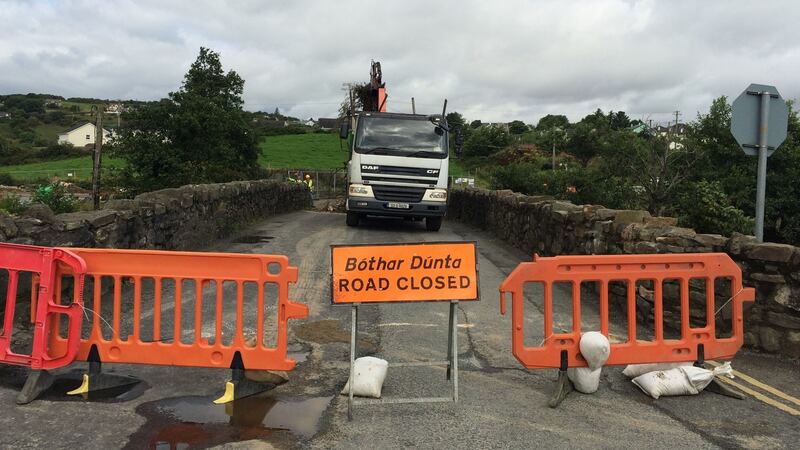 Clean up operations under way at Cockhill Bridge in Buncrana, Co Donegal. Photograph: Brian Hutton/PA Wire