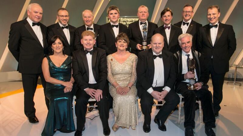 Back row from left: Tom Hayes of Enterprise Ireland; Kevin McLoughlin of EY; Industry winner Jack Dobson of Dunbia; Overall winner John Collison; International winners Pádraig McBride and Donald Fitzmaurice of Brandtone; Seán Duffy of EY; Jeremy Fitch of Invest Northern Ireland; front row: Anne Heraty, chairwoman of the judging panel; Mike McKerr of EY; Arlene Foster Northern Ireland Minister for Finance; Michael Noonan Minister for Finance; and Fr Peter McVerry. Photograph: Dave Meehan