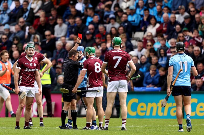 Referee Colm Lyons awards a red card to David Burke during last summer's Galway v Dublin game at Pearse Stadium. Photograph: Ben Brady/Inpho