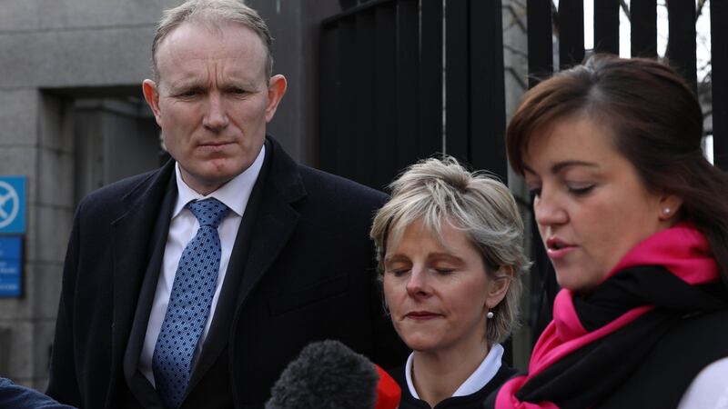 Gerard and Mary Costello, parents of Tadgh Costello  with  their solicitor Susie Elliott  outside the  Four Courts   on Tuesday. Photograph: Collins Courts