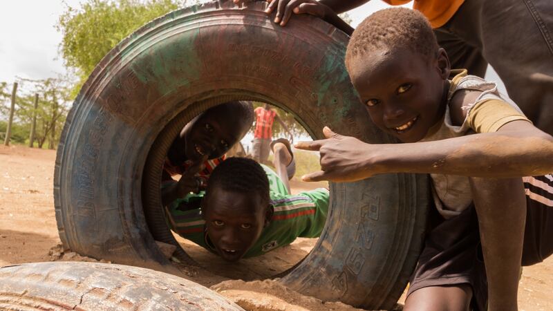 Young boys enjoying some time off school in Kakuma refugee camp, where high temperatures restrict leisure time to the late afternoon and evening. Photograph: Ruairi Casey