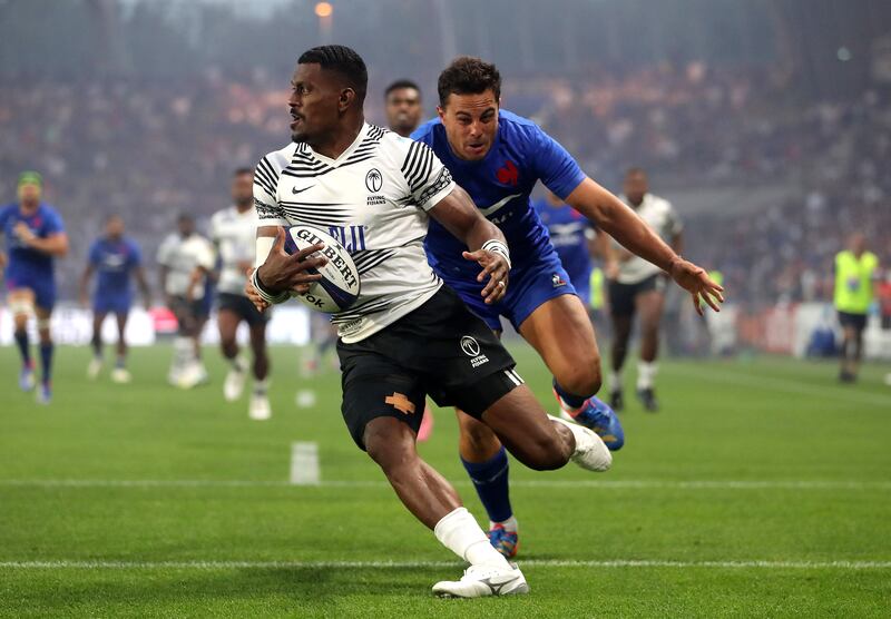 Fiji's Josua Tuisova and Arthur Vincent of France. Photograph: Bryan Keane/Inpho