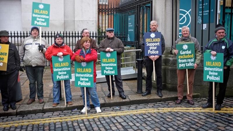 Members of the GRA protest at Dublin Castle today.