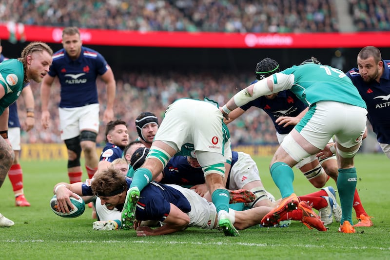 Oscar Jegou scores France's fourth try against Ireland. Photograph: David Rogers/Getty Images