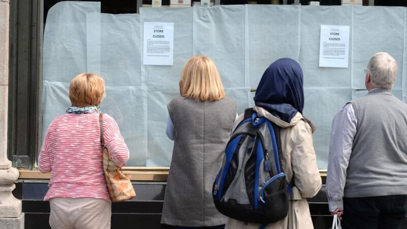 Notices posted at Clerys on O’Connell Street in Dublin, which closed suddenly last week. Photograph: Dara Mac Donaill