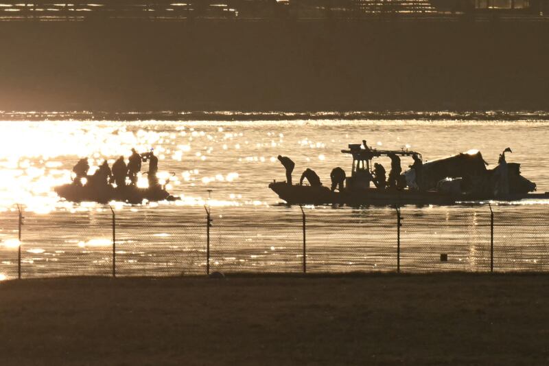 Part of the wreckage is seen as rescue crews search the waters of the Potomac River after a passenger plane on approach to Reagan National Airport crashed into the river after colliding with a US Army helicopter. Photograph: ANDREW CABALLERO-REYNOLDS/AFP via Getty Images