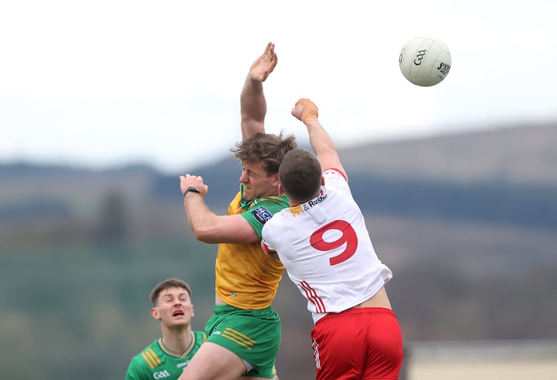 Donegal's Hugh McFadden and Conn Kilpatrick of Tyrone in a league Division 1 match at Letterkenny, Donegal, on March 16th, 2025. Photograph: Bryan Keane/Inpho