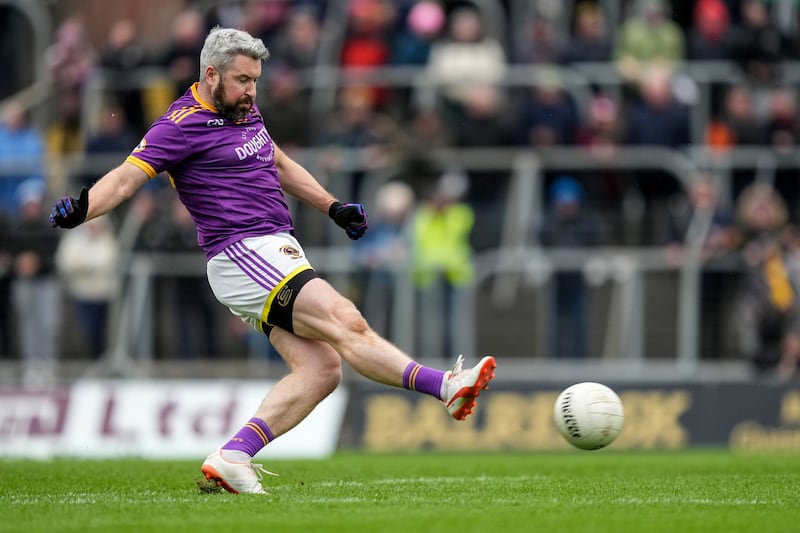 Cian Ward scores a goal for Wolfe Tones at Páirc Tailteann. Photograph: James Lawlor/Inpho