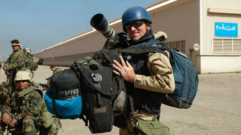 Irish-Cuban photographer Desmond Boylan, the son of Dublin parents, working  in southern Iraq during the US invasion.