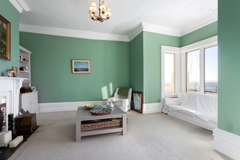 The three reception rooms all face the sea, with the drawing room having a superb bay window