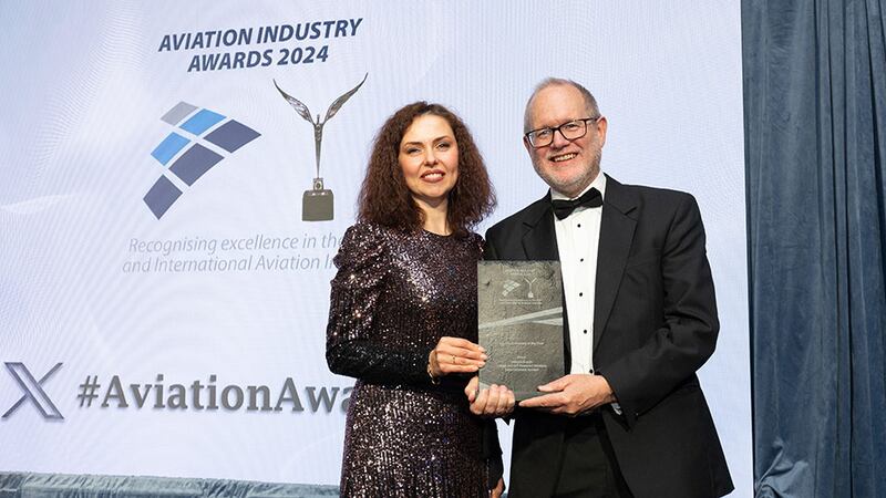 Viktoriia Ivannikova, our judging coordinator, presents the aviation company of the year to David Miller, Inflight Dublin