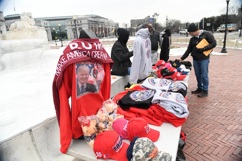 Merchants sell Trump buttons and shirts near the US Capitol on January 17 ahead of his inauguration on Monday. Photograph: Matthew Hatcher/AFP/Getty Images