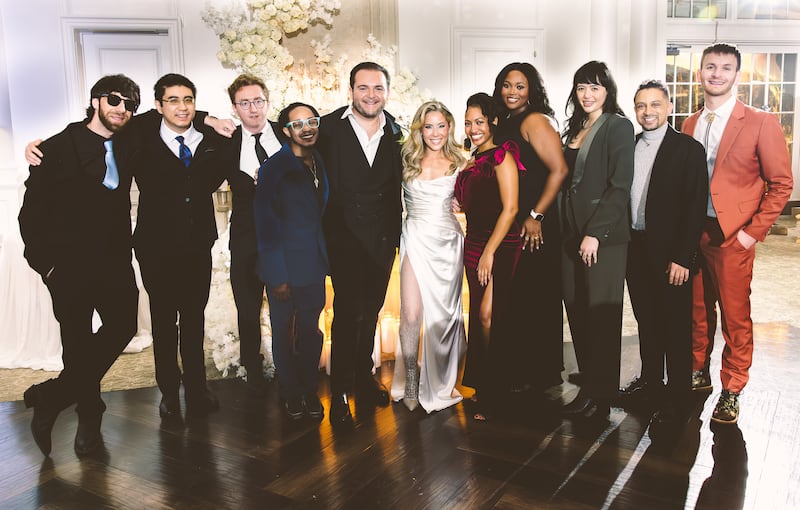 Angelo Massagli and Caitlin Hale (centre) at their wedding celebration. Photograph: Julian Ribinik Studios/The New York Times