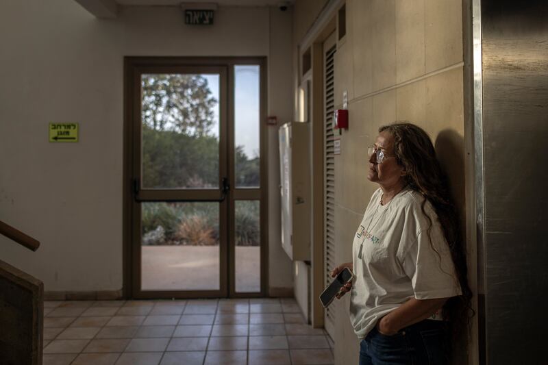 Naomi Hershfeld, a survivor of the Hamas attack on the kibbutz of Kfar Aza, in Shefayim, Israel, this month. 'If we don’t go back there, there’ll be no state,' she says. Photograph: Avishag Shar-Yashuv/New York Times
                      