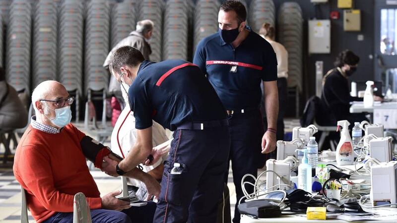 Firefighters conduct health check-ups in a temporary vaccination centre in the Parc des Expositions,  Toulouse: Photograph: Georges Gobet