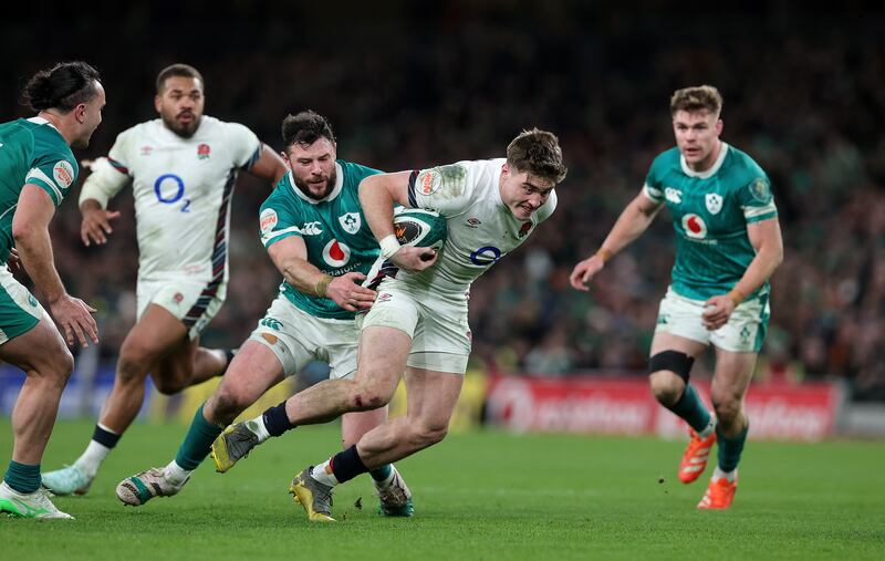 England's Tommy Freeman is tackled by Ireland's Robbie Henshaw during the Six Nations first round fixture at the Aviva Stadium. Photograph: David Rogers/Getty Images