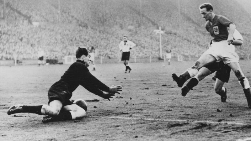 Tom Finney in action for England against West Germany at Wembley Stadium in 1954. Photograph:  Hulton Archive/Getty Images