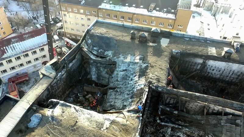 An aerial view of the multistory shopping complex after the  fire in the Siberian city of Kemerovo. Photograph: AP