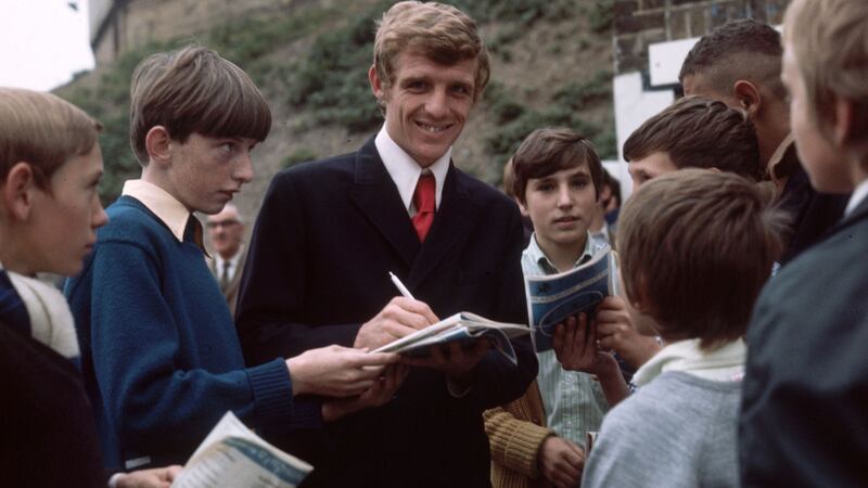 Eamon Dunphy signs autographs during his time with Millwall. Photograph: Express/Getty