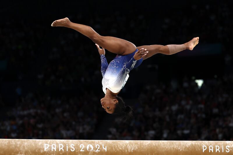 Simone Biles of the USA competes during the Artistic Gymnastics Women's Balance Beam final. Photograph: Naomi Baker/Getty Images