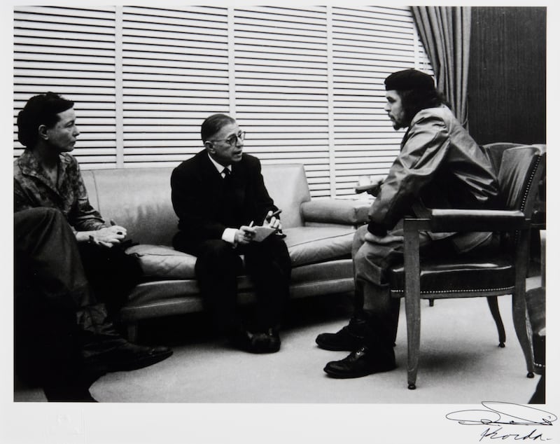 A 1960s photograph of French intellectuals Simone de Beauvoir and Jean Paul Sartre with Che Guevara by photographer Alberto Korda (€1,000-€1,500) at Morgan O'Driscoll art auction