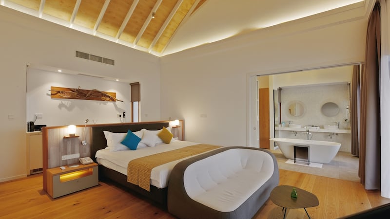 The enormous bedroom features a super kingsize bed, fully stocked wine fridge and  a panoramic view of the ocean. The bathroom is stocked with  Voya toiletries from  Co Sligo.