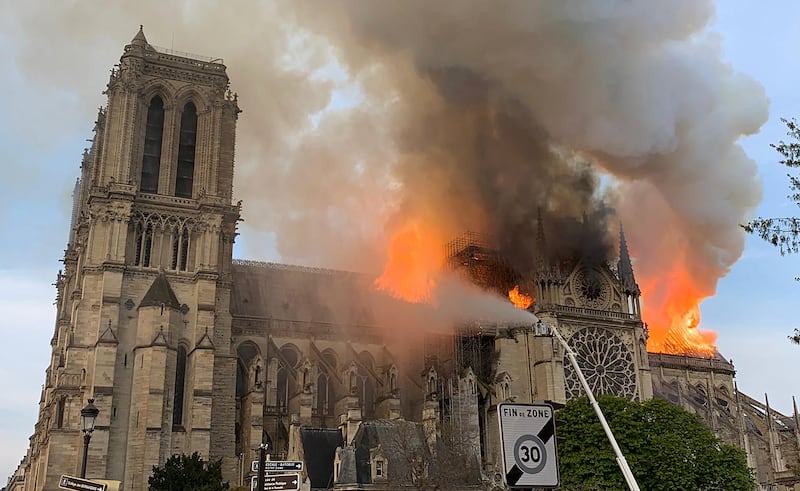 Flames and smoke are seen billowing from the roof at Notre-Dame cathedral on April 15th, 2019. Photograph: Patrick Anidjar/AFP via Getty Images)