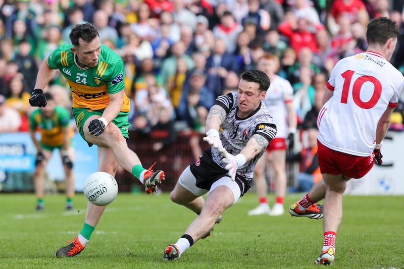 Tyrone's Niall Morgan blocks a shot to deny Donegal's Aaron Doherty. Photograph: Lorcan Doherty/Inpho