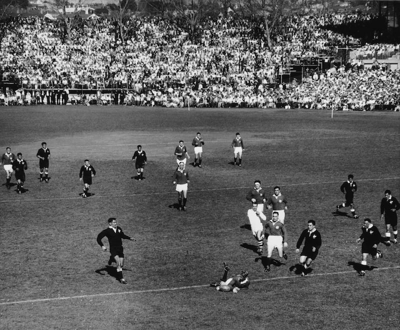 Ken Scotland of the Lions crosses the line, but loses the ball at the critical moment, resulting in his try being disallowed, during a match against the New Zealand Maoris in 1959.  Lions eventually won 12-6. Photograph: Central Press/Hulton Archive/Getty Images 