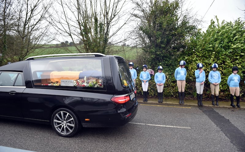 Members of the Duhallow Hunt and Pony Club form a guard of honour at the funeral of jockey Michael O'Sullivan. Photograph: Michael Mac Sweeney/Provision