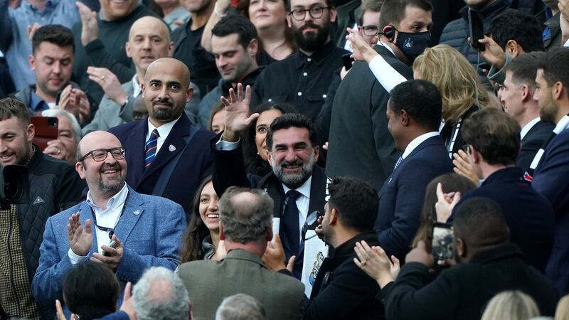 New Newcastle United chairman Yasir Al-Rumayyan waves to supporters prior to kick-off in the Premier League match against Tottenham Hotspur at St James’ Park. Photo: Owen Humphreys/PA Wire