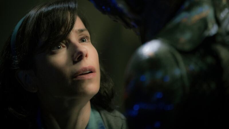 This image released by Fox Searchlight Pictures shows Sally Hawkins, left, and Doug Jones in a scene from the film "The Shape of Water." The film was nominated for an Oscar for best picture on Tuesday, Jan. 23, 2018. The 90th Oscars will air live on ABC on Sunday, March 4. (Kerry Hayes/Fox Searchlight Pictures via AP)