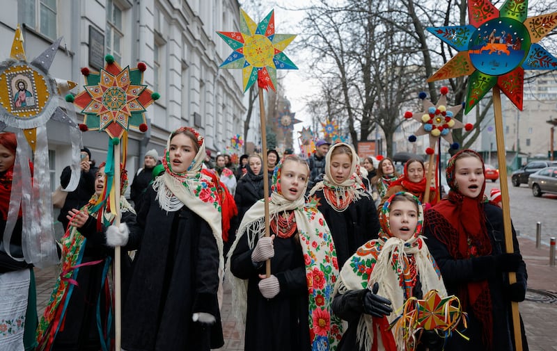 Ukrainians sing Christmas carols and carry decorated stars of Bethlehem in Kyiv. Last year, Ukraine moved the official Christmas Day holiday to December 25th, departing from the Russian Orthodox Church tradition of celebrating on January 7th.