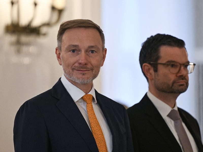 Outgoing German finance minister Christian Lindner (left) and justice minister Marco Buschmann listen as President Frank Walter Steinmeier speaks at the presidential Bellevue Palace in Berlin on Thursday. The day before, Chancellor Olaf Scholz had sacked Lindner. Photograph: Ralf Hirschberger/AFP/Getty 