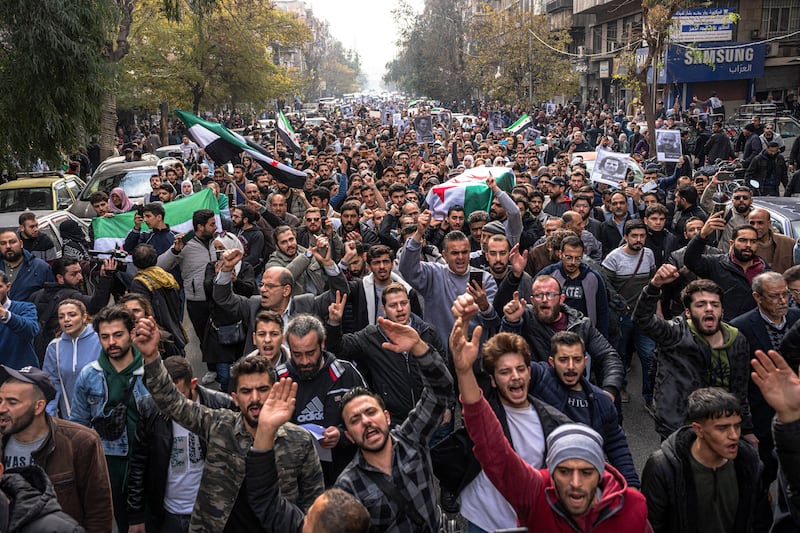 Mourners carry the coffin of Mazen Hamada, a Syrian activist who described his torture under the Assad regime, during his funeral in Damascus, Syria, on Thursday, December 12th, 2024. Photograph: Daniel Berehulak/The New York Times
                      