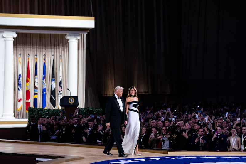 Donald Trump and Melania Trump arrive at the Commander-in-Chief ball. Ms Trump was dressed by her stylist, Herve Pierre. Photograph: Al Drago/Bloomberg