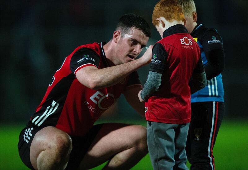 Allianz Football League Division 2, Pairc Esler, Down 15/2/2025
Down vs Meath
Down’s Adam Crimmins signs a jersey for a young supporter after the game against Meath. Photograph: Leah Scholes/Inpho