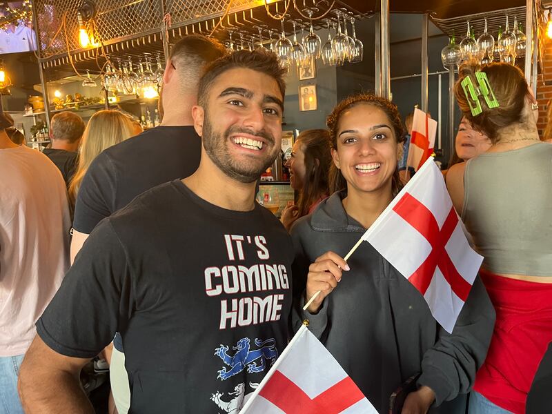 Arsenal fan Mihir and his sister Meena watching the World cup final in Balham. Photograph: Mark Paul