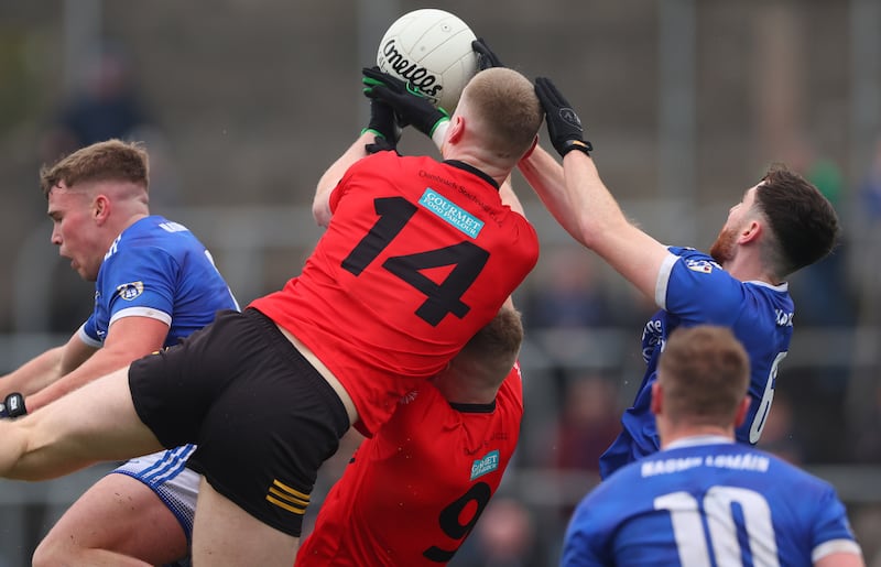 Dunshaughlin’s Mathew Costello and Eoghan Hogan of St Loman's compete for possession. Photograph: James Crombie/Inpho