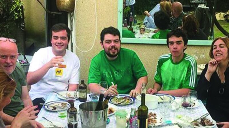 La famiglia O’Curráin (Finbarr O’Curráin and Sheila Dunne, left and right) with their sons Conor, Oisín and Lorcan before Rome went into the Red zone