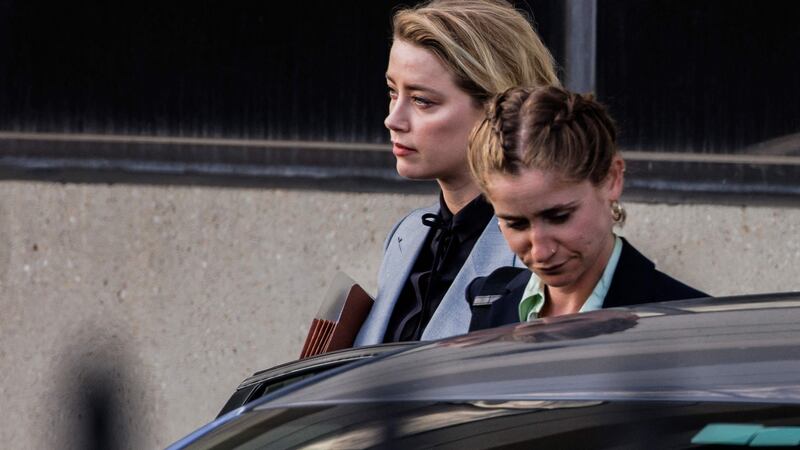 Amber Heard leaves the Fairfax County Circuit Court in Fairfax, Virginia where she is being sued for defamation by her former husband,  actor Johnny Depp, over an article in The Washington Post in 2018. Photograph: Samuel Corum/AFP via Getty Images