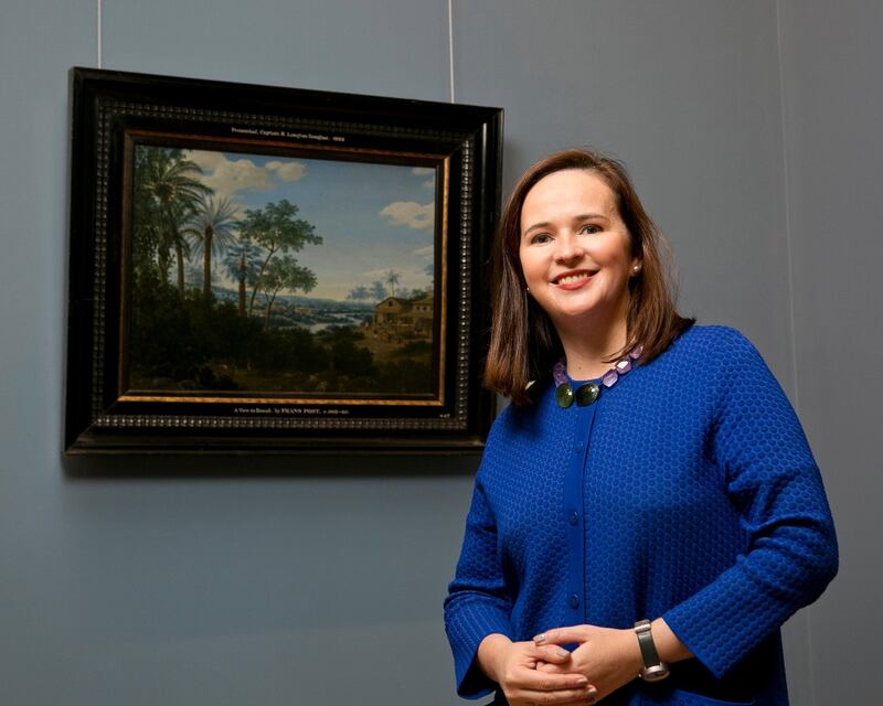 Frans Post: exhibition curator Niamh MacNally with the National Gallery’s own painting by the artist, Brazilian Landscape, 1660s. Photograph: Chris Bellew/Fennell