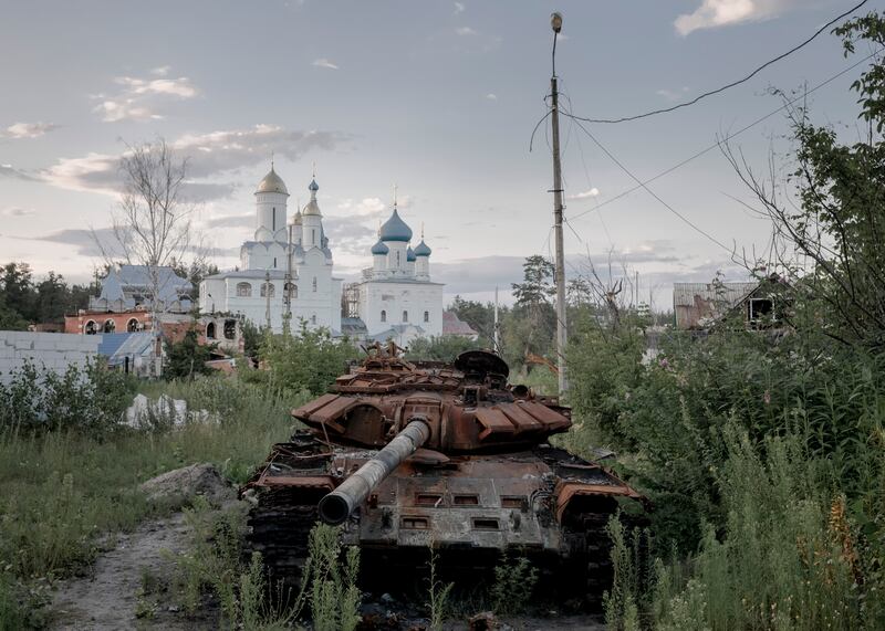 A Russian tank which was destroyed by Ukrainian forces during a battle last year to retake the town of Sviatohirsk, eastern Ukraine. Photograph: Emile Ducke/The New York Times