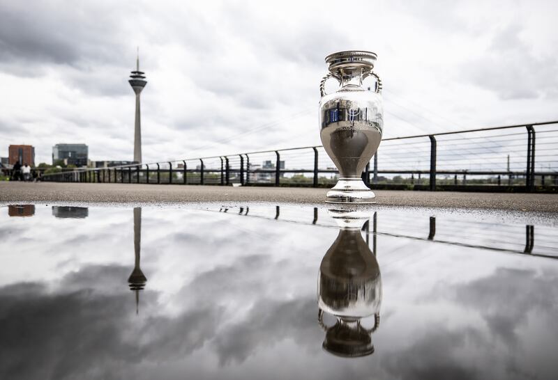 The Euro 2024 trophy at the river Rhine in Duesseldorf, Germany, during a trophy tour on April 9th, 2024. Photograph: Lars Baron /Uefa via Getty Images